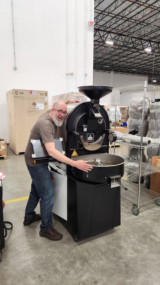 Aaron Grimeau at the Probat factory picking up his Probat P05e roaster 